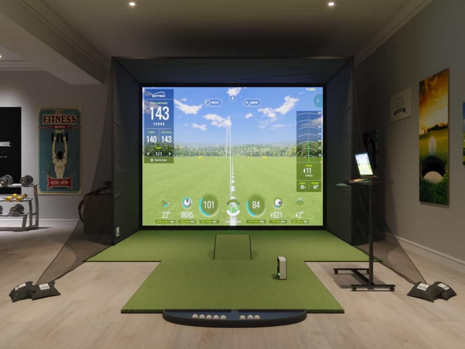 SKYTRAK SWINGBAY Indoor Golf Simulator Package Setup with miscellaneous items in the background